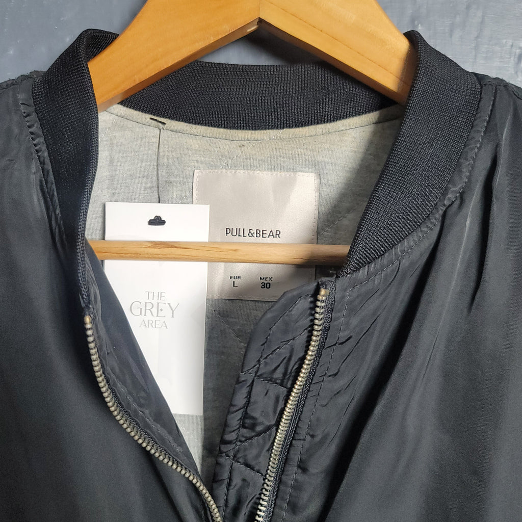 Black Pull& Bear Bomber jacket with flap pockets, ribbed trims and zip fastening (Unisex) - THE GREY AREA
