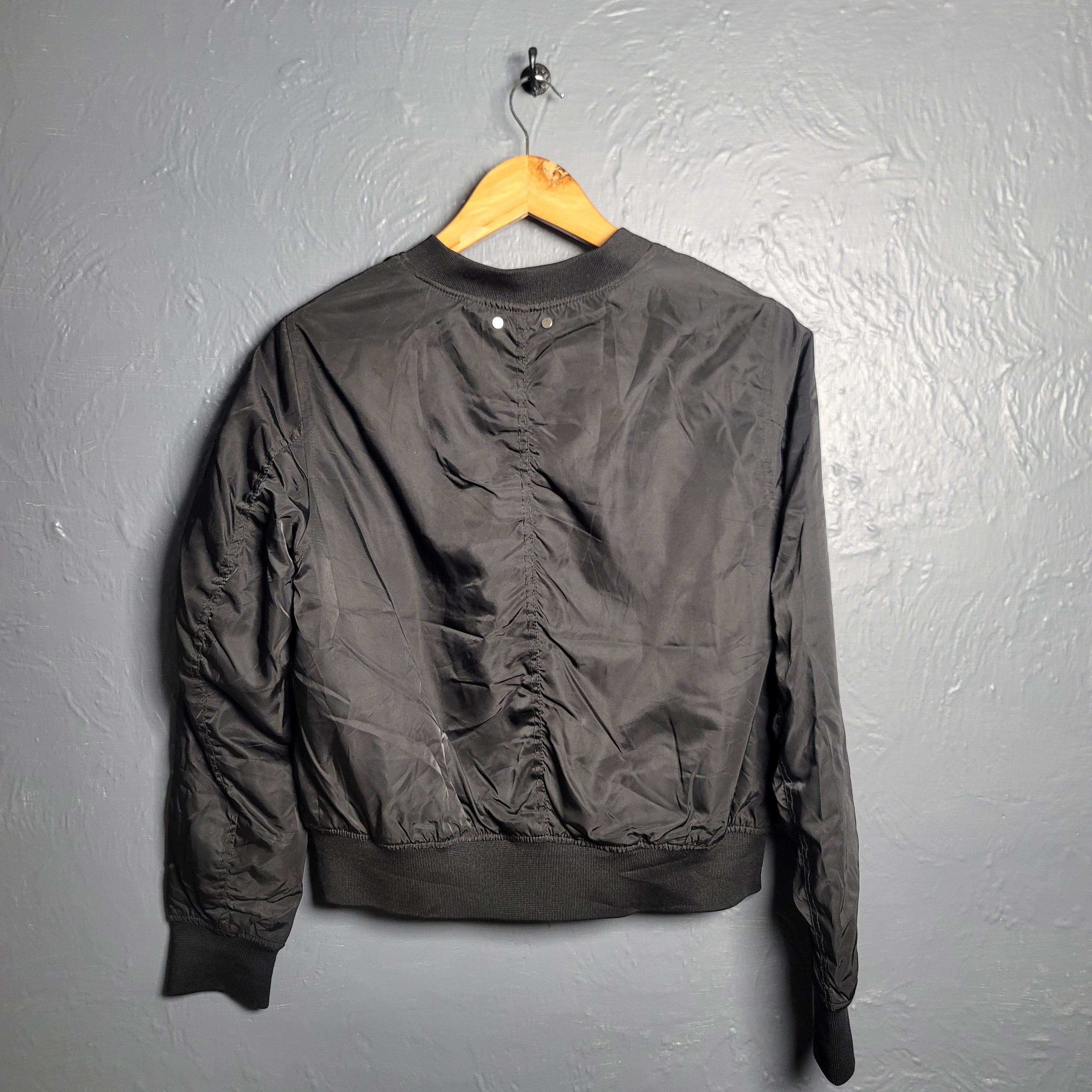 Black Pull& Bear Bomber jacket with flap pockets, ribbed trims and zip fastening (Unisex) - THE GREY AREA