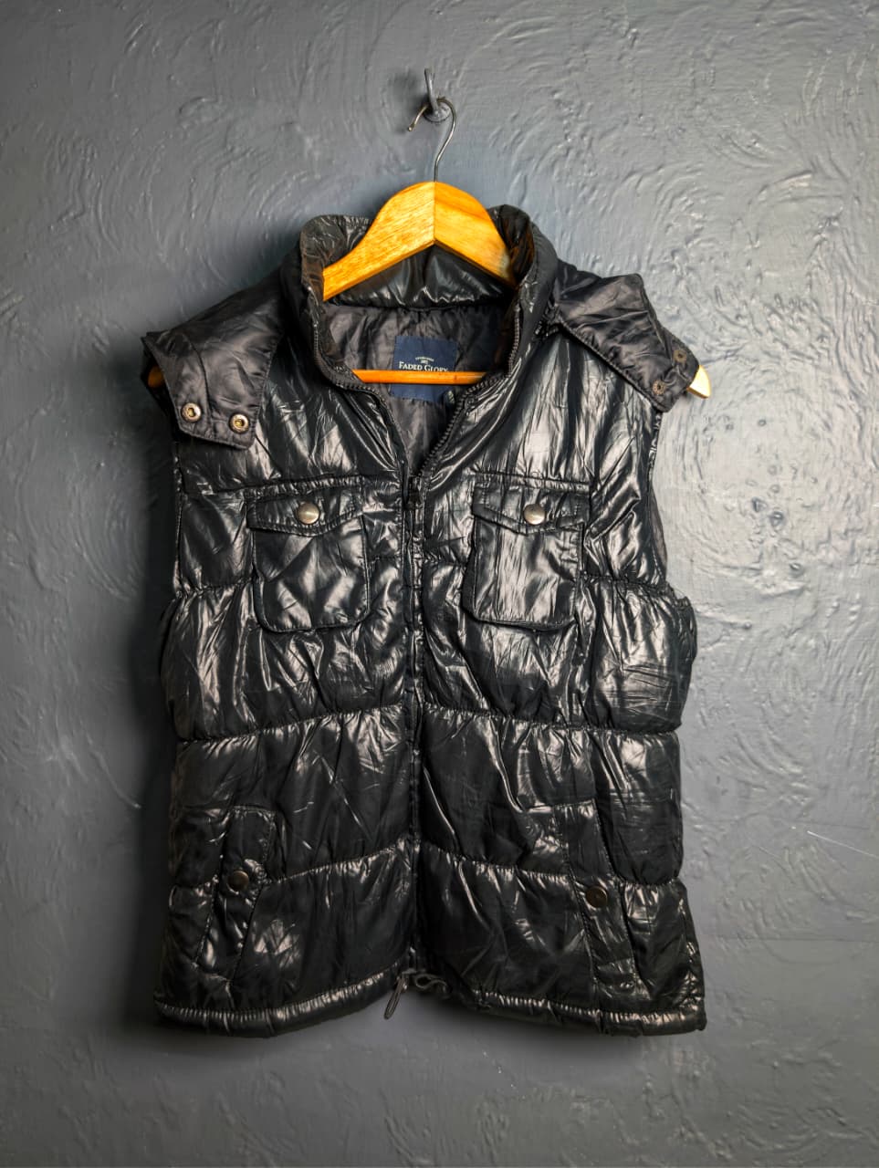 Women's shiny black hooded puffer vest