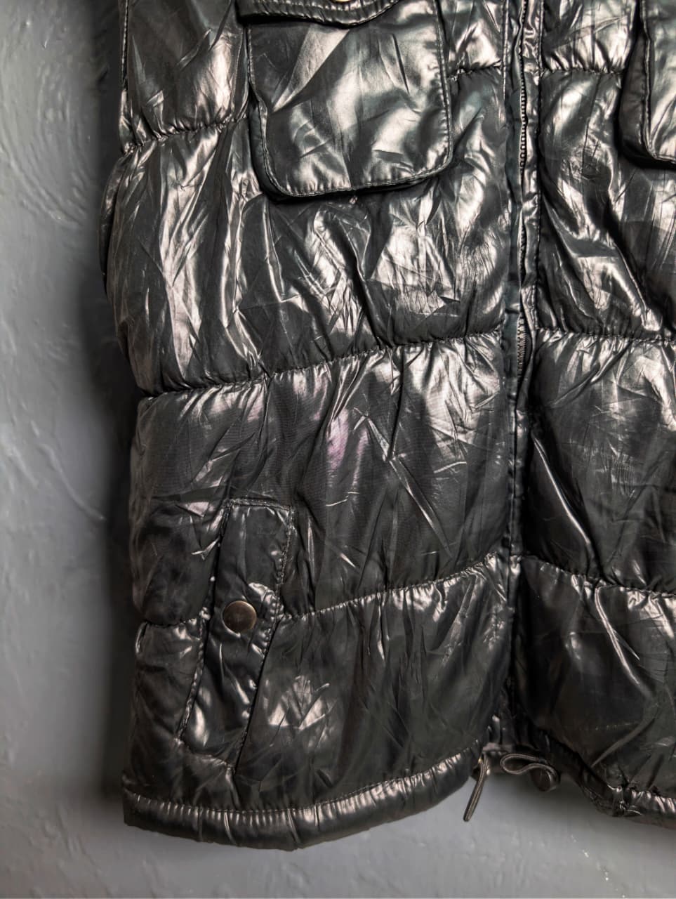 Women's shiny black hooded puffer vest