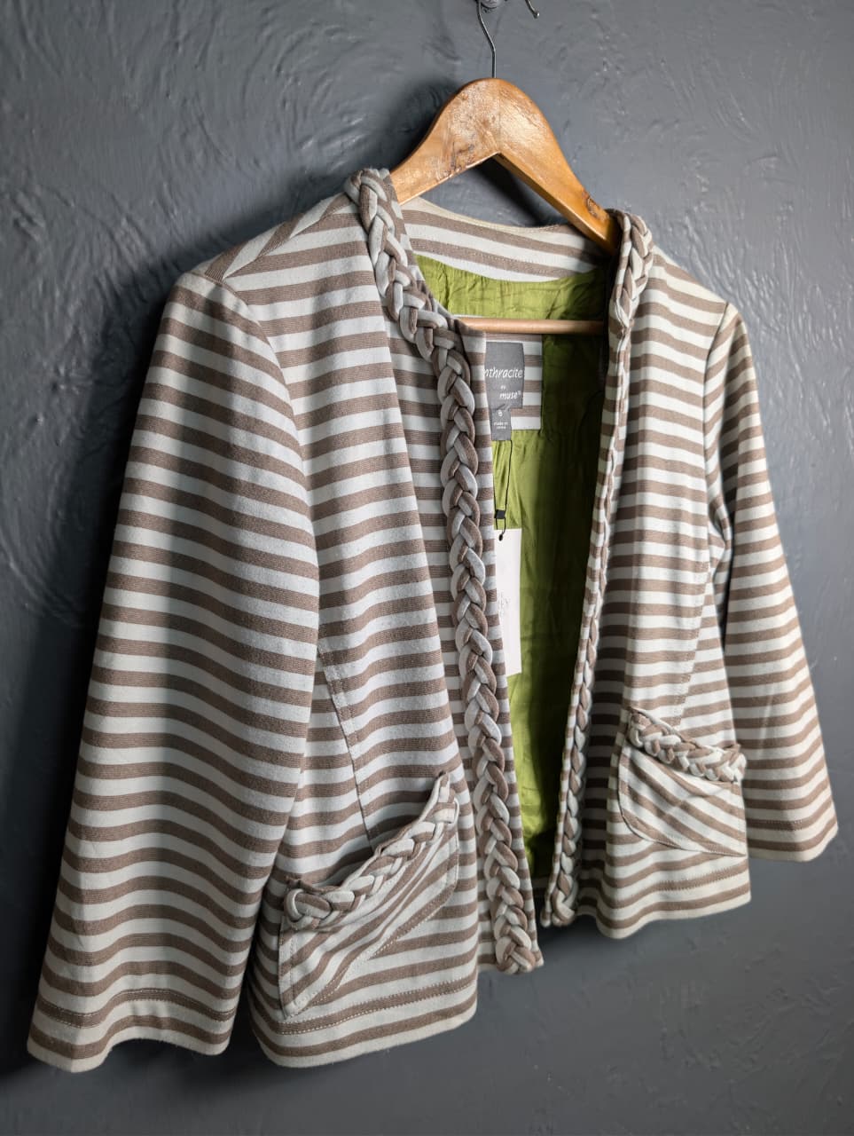 Women's open-front jacket with braided trim along the collar