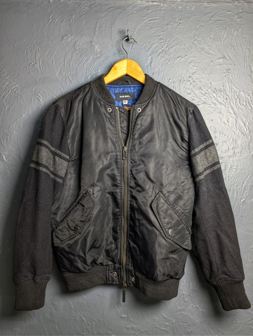 Men's Diesel MA-1 bomber jacket with wool sleeves.