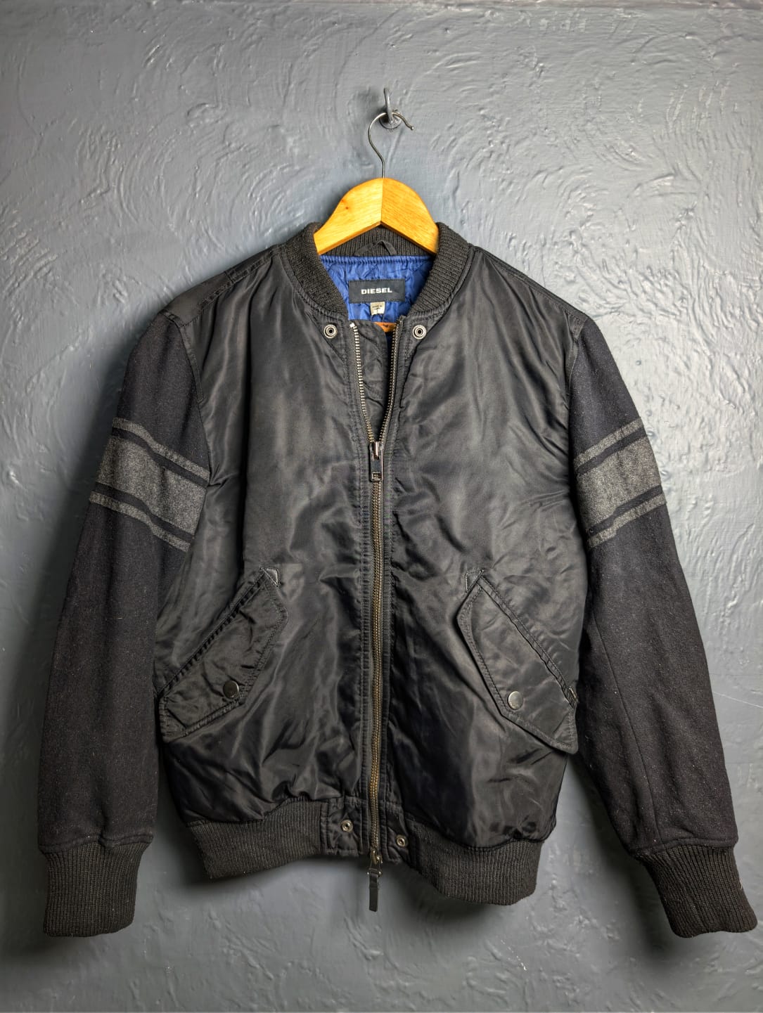Men's Diesel MA-1 bomber jacket with wool sleeves.