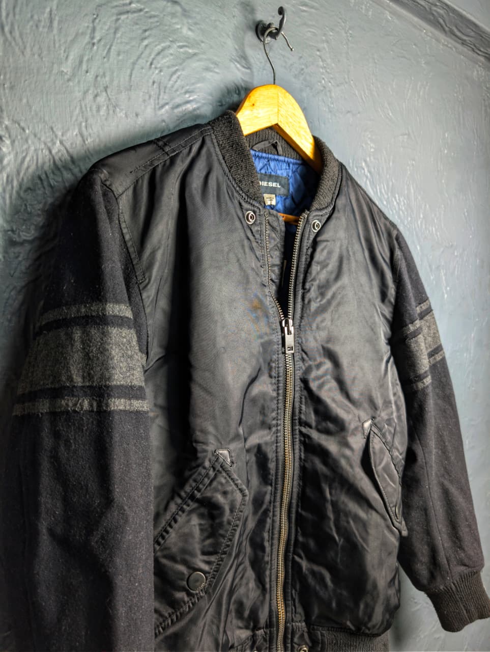 Men's Diesel MA-1 bomber jacket with wool sleeves.