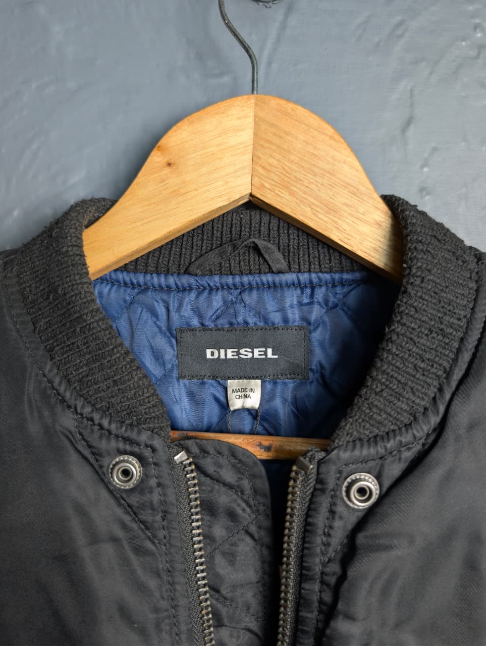 Men's Diesel MA-1 bomber jacket with wool sleeves.