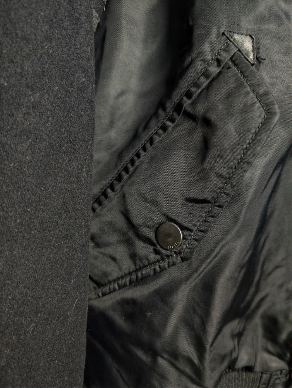 Men's Diesel MA-1 bomber jacket with wool sleeves.