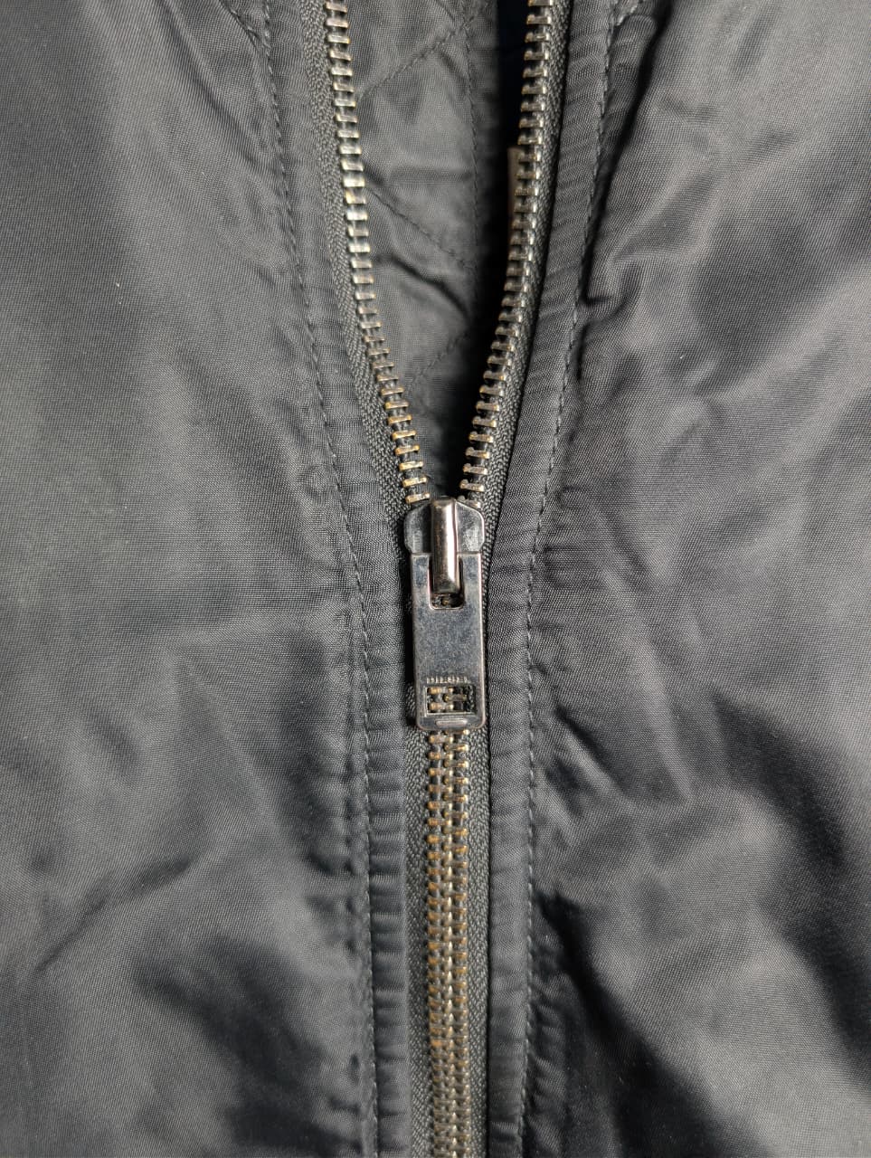 Men's Diesel MA-1 bomber jacket with wool sleeves.