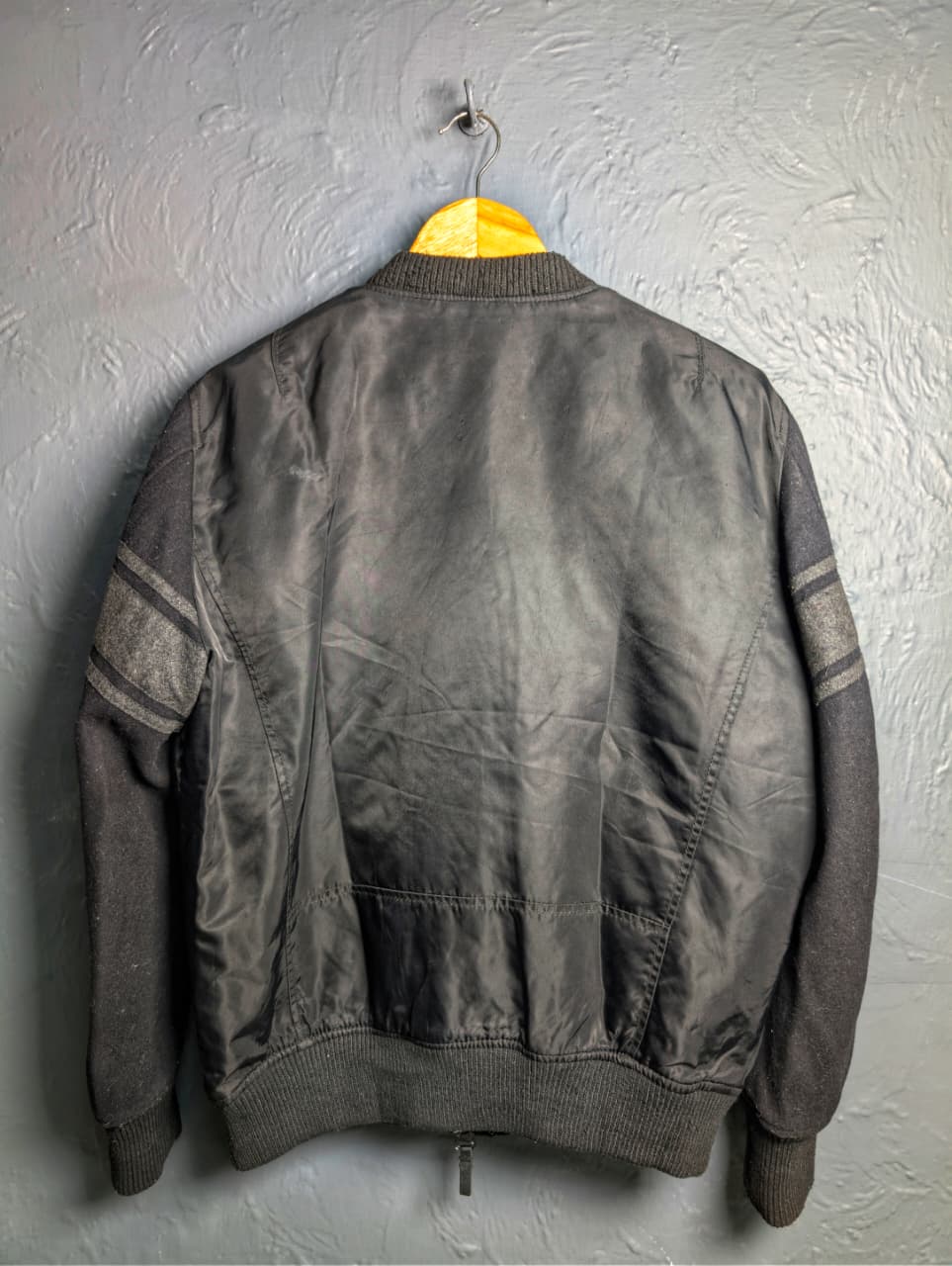 Men's Diesel MA-1 bomber jacket with wool sleeves.