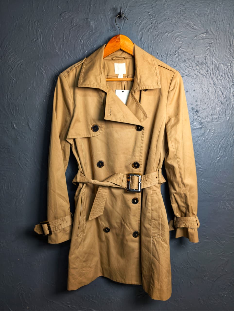 Beige Double-breasted Mama trench coat from H&M.