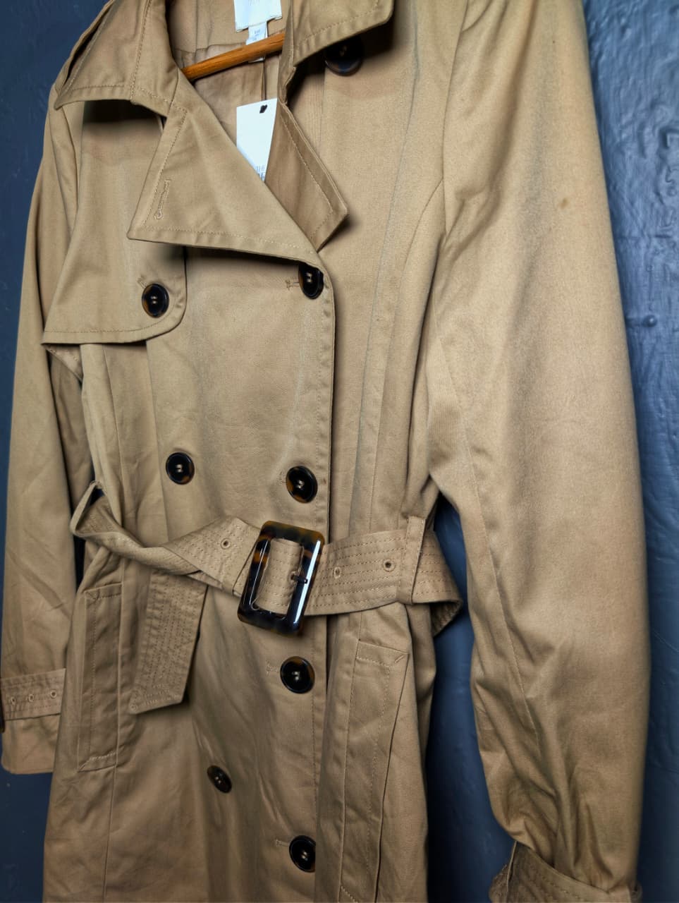 Beige Double-breasted Mama trench coat from H&M.