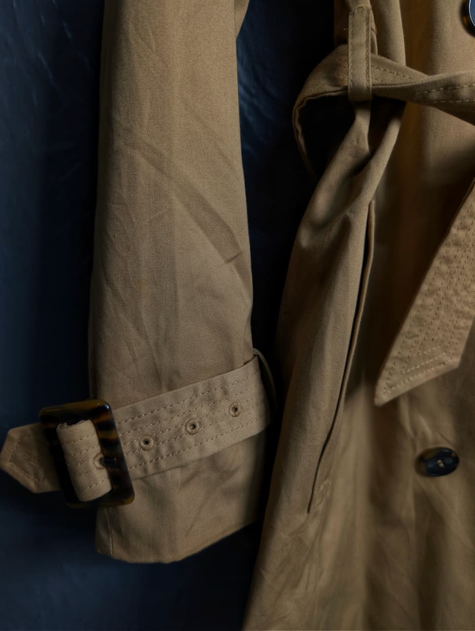 Beige Double-breasted Mama trench coat from H&M.