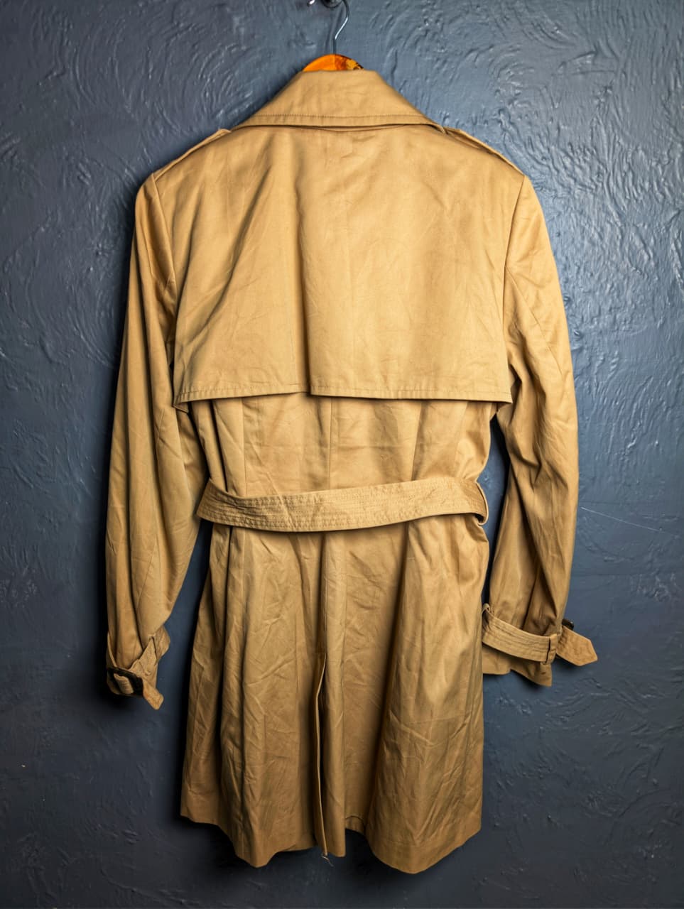 Beige Double-breasted Mama trench coat from H&M.