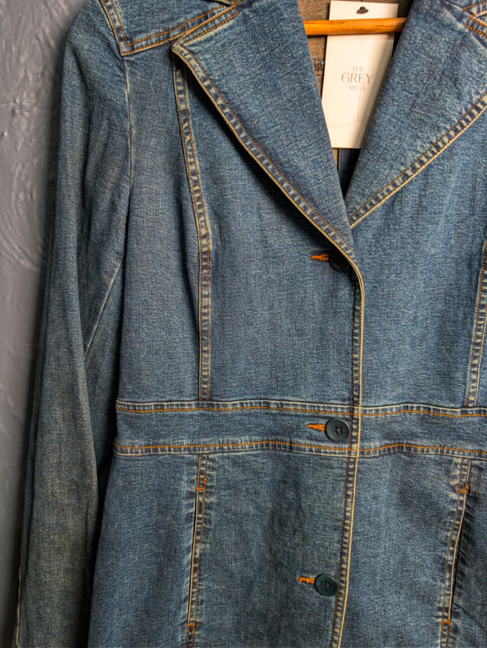 Vintage-inspired, Y2K-era long denim trench coat