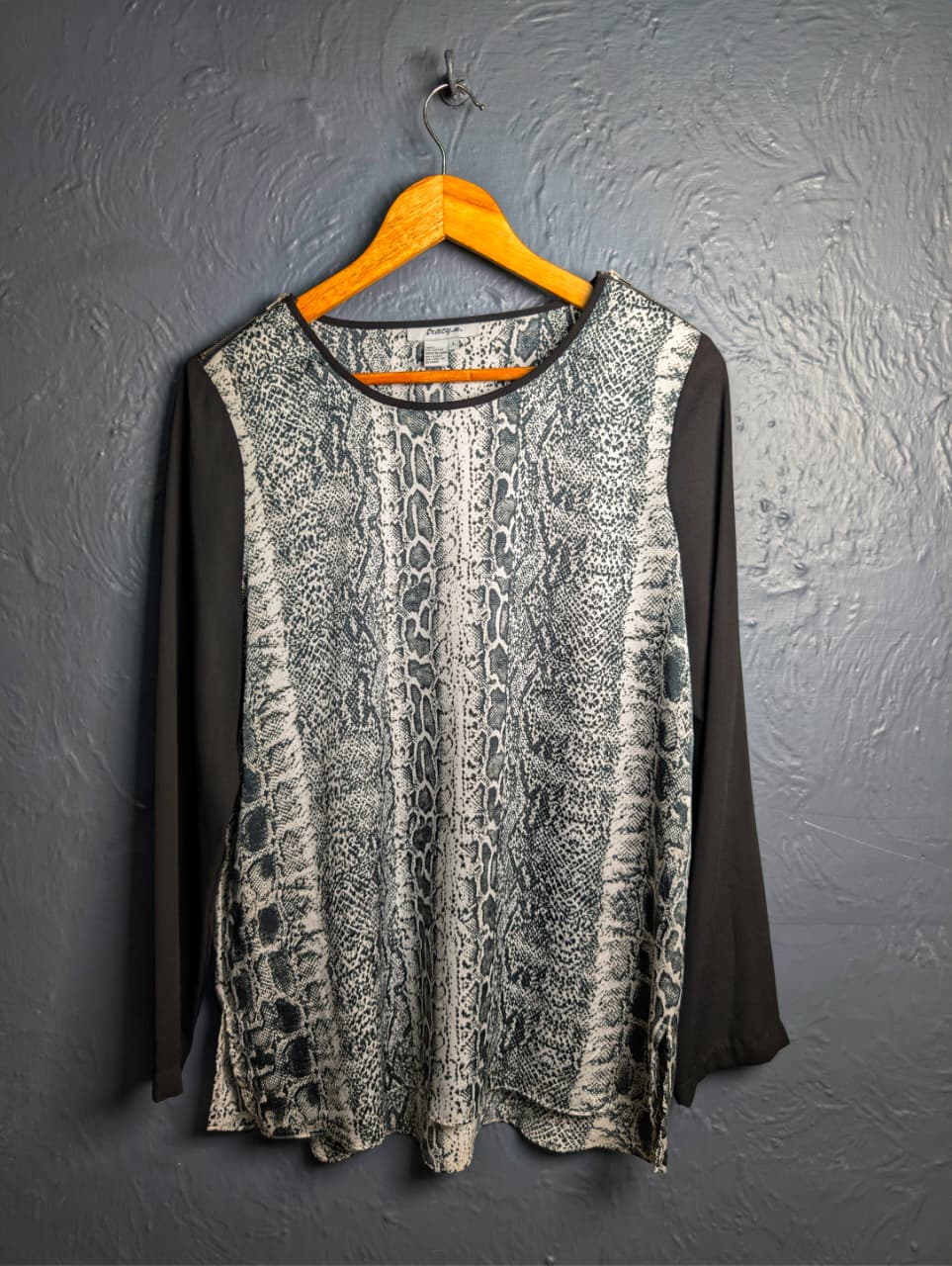 Women's Grey and black top with python print.