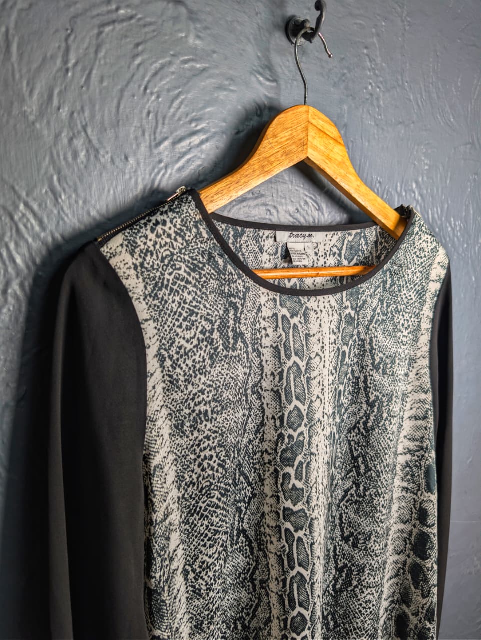 Women's Grey and black top with python print.