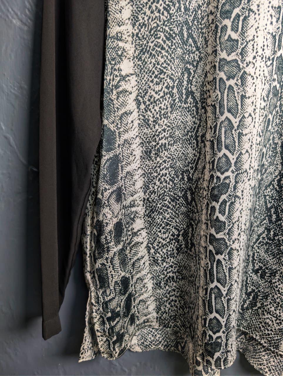 Women's Grey and black top with python print.