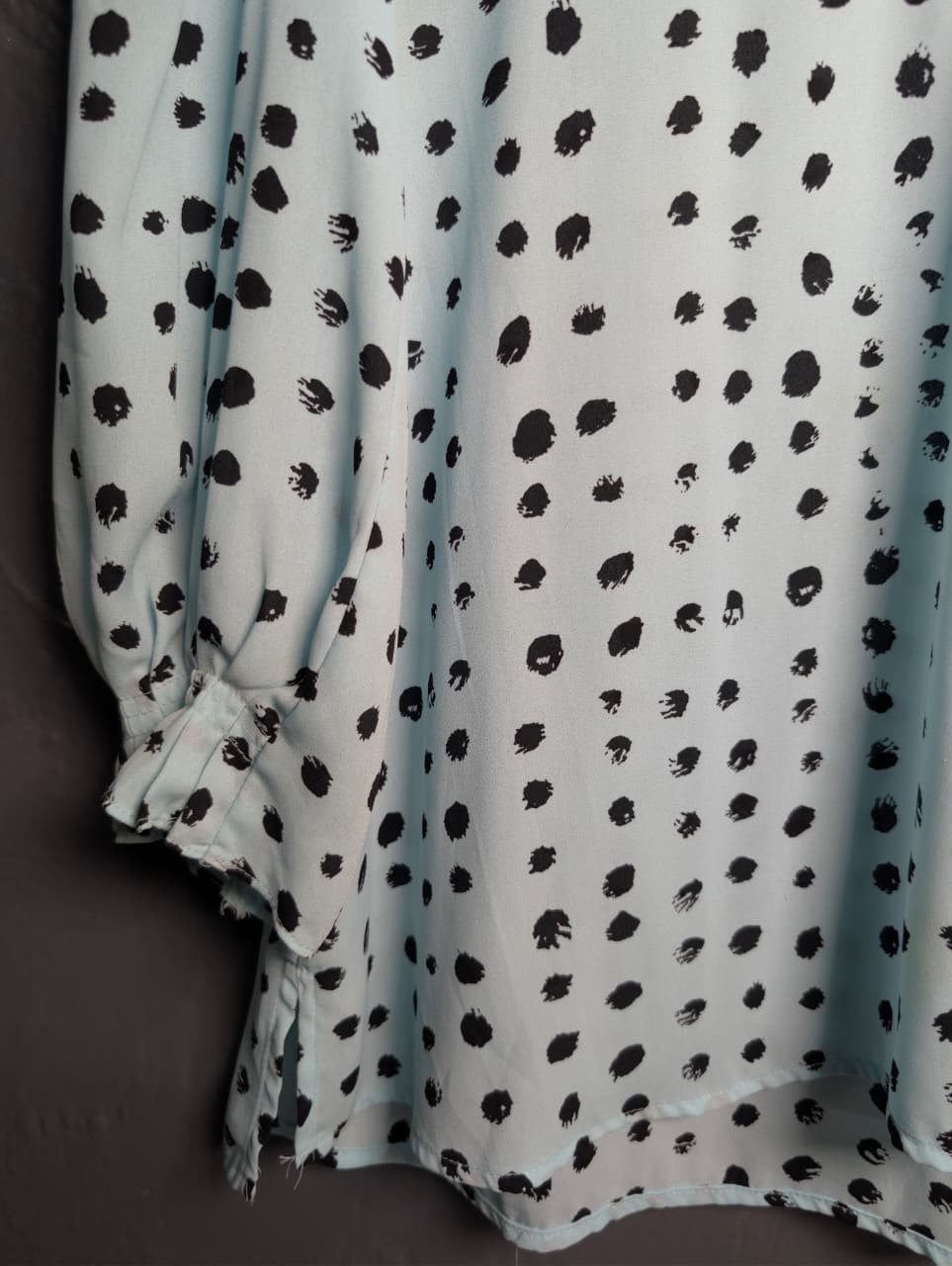 Worthington light blue top with a black polka dot pattern.