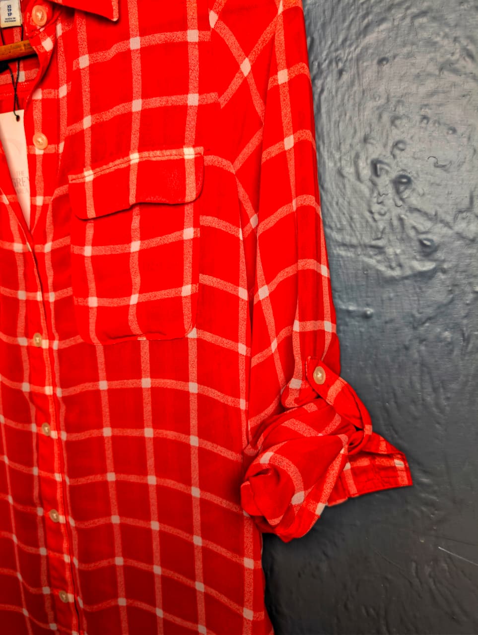 Old Navy red and white plaid button-down shirt.