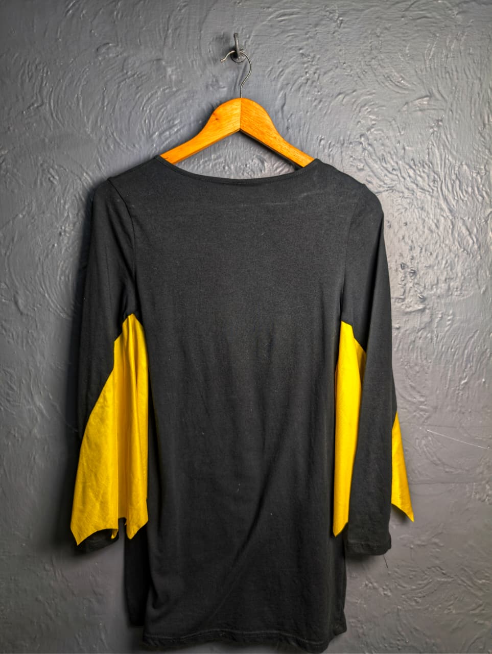 DC Comics Batgirl costume top with a glittery gold Batman logo