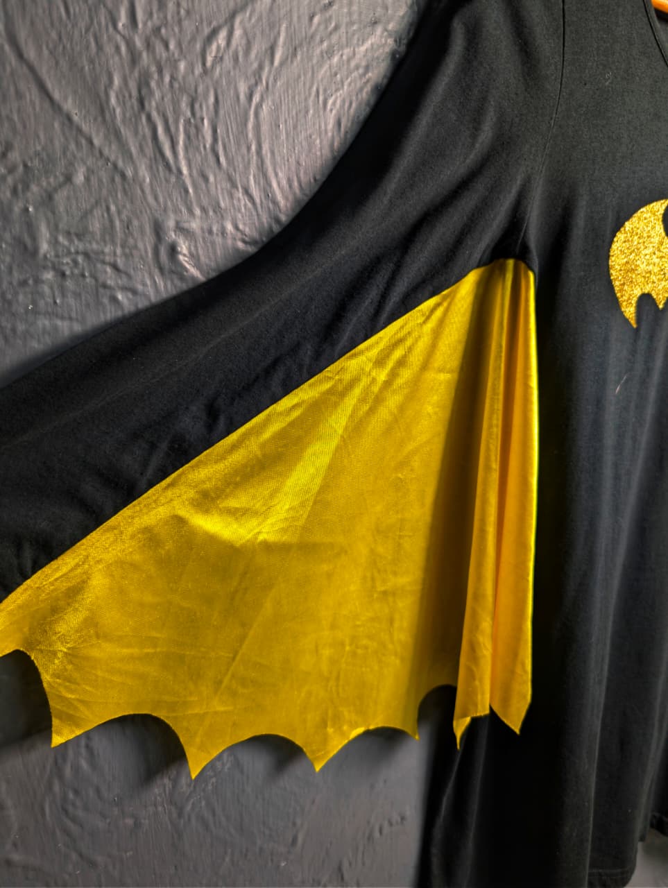 DC Comics Batgirl costume top with a glittery gold Batman logo