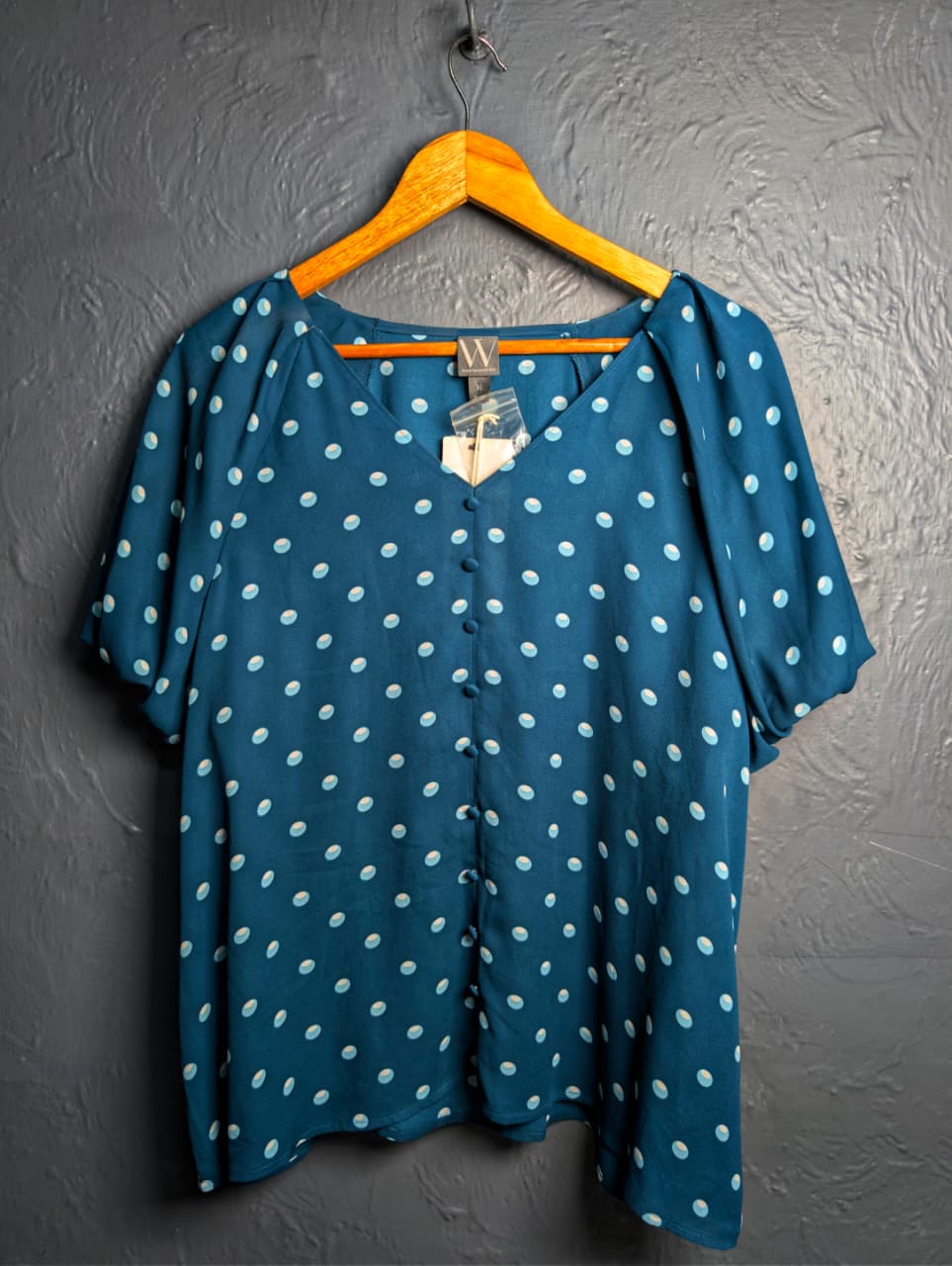 Brand New Worthington teal & polka dot top featuring short puff sleeves and a v-neckline.