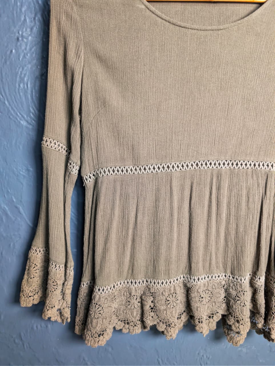 Stylish long-sleeved tunic top with lace trim detailing