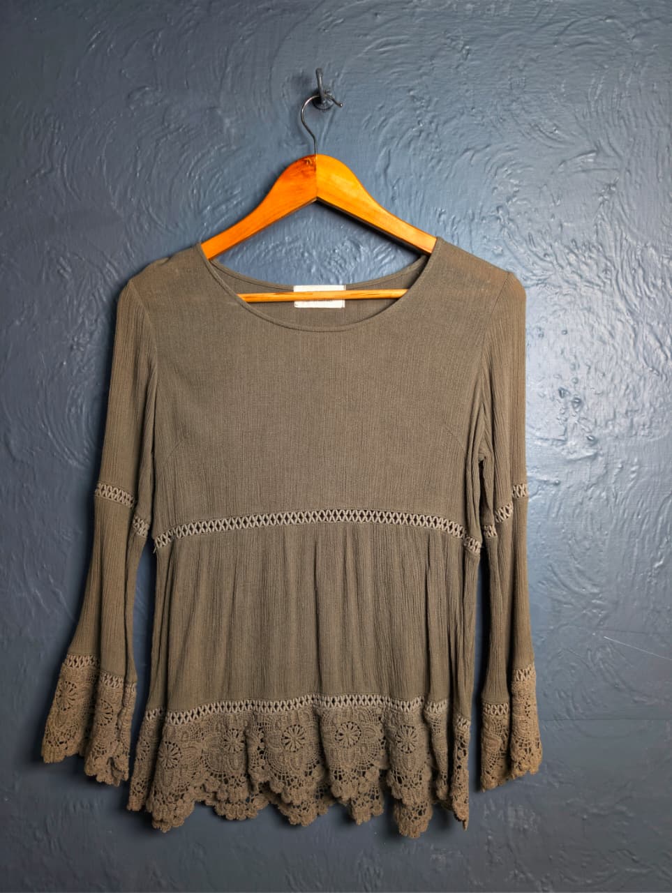 Stylish long-sleeved tunic top with lace trim detailing