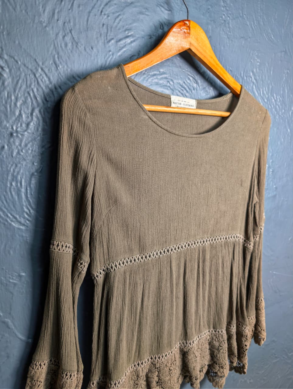 Stylish long-sleeved tunic top with lace trim detailing