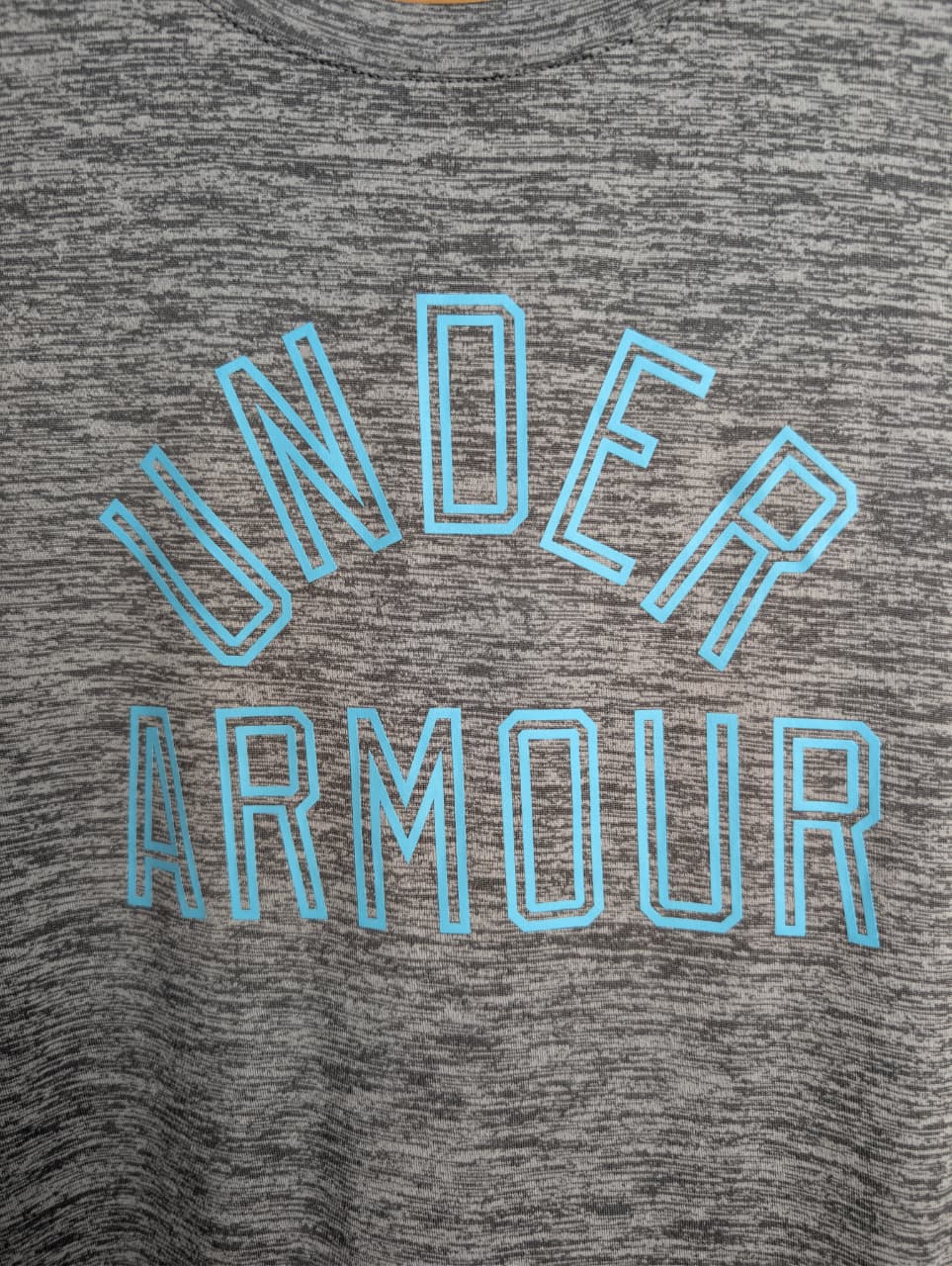 Under Armour Women's T-Shirt with an aqua logo