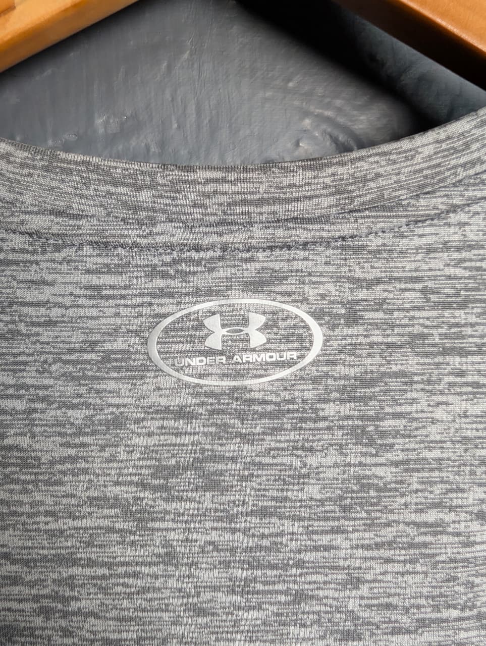 Under Armour Women's T-Shirt with an aqua logo